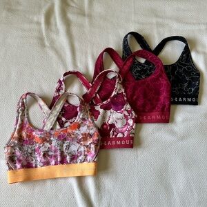 Under Armour bras, size small, black, fuchsia, orange.